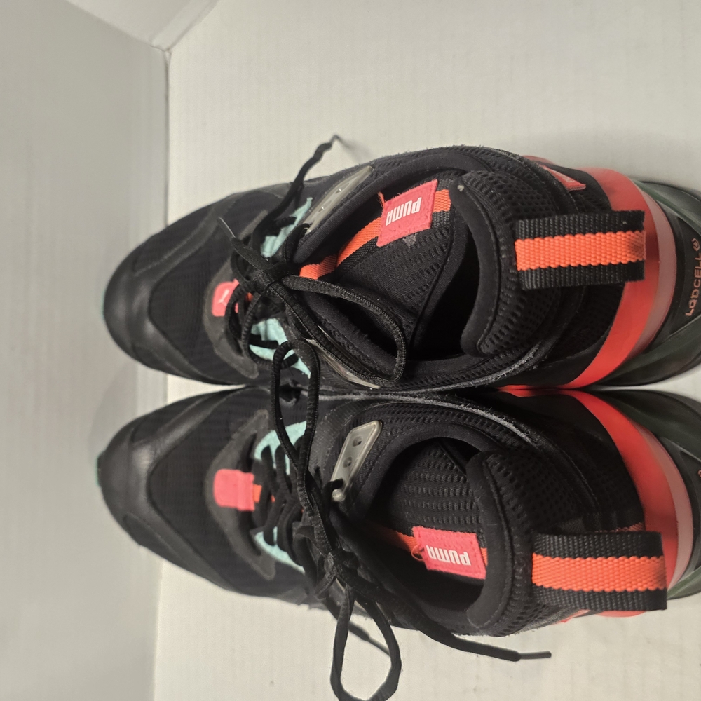 Puma Black and Orange Sneakers